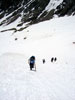 We climb past evidence of old avalanches on the southeast face of Mount Tol...