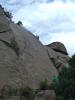 Julie climbs up Emergency Entrance (5.6+) to clean up the anchor, completin...