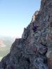 Chris scrambles on the western side of Maroon Peak's southern ridge....
