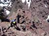 Chris and Alan scramble up the last section to the summit of North Maroon P...