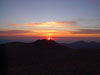The sun rises over Battle Mountain, 4.5 miles into the climb....