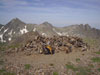 View to the west from the summit of Lulu Mountain. Poudre eats a snack of P...