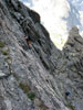 Mike and John negotiate the spicy downclimb into McHenrys Notch....