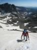 Fabio ascending Navajo Snowfield.  Shoshoni Peak and Lake Isabelle can bee ...