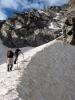 The team traverses below Taylor Peak's east face to get into the line that ...