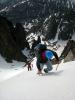 Fabio tops out of the couloir not 20 meters east of the summit of Otis Peak...