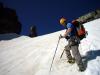 Me ascending Navajo Snowfield with Dicker's Peck towering above....