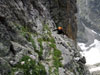Me scrambling along the ledge system to the saddle. The scrambling was non-...